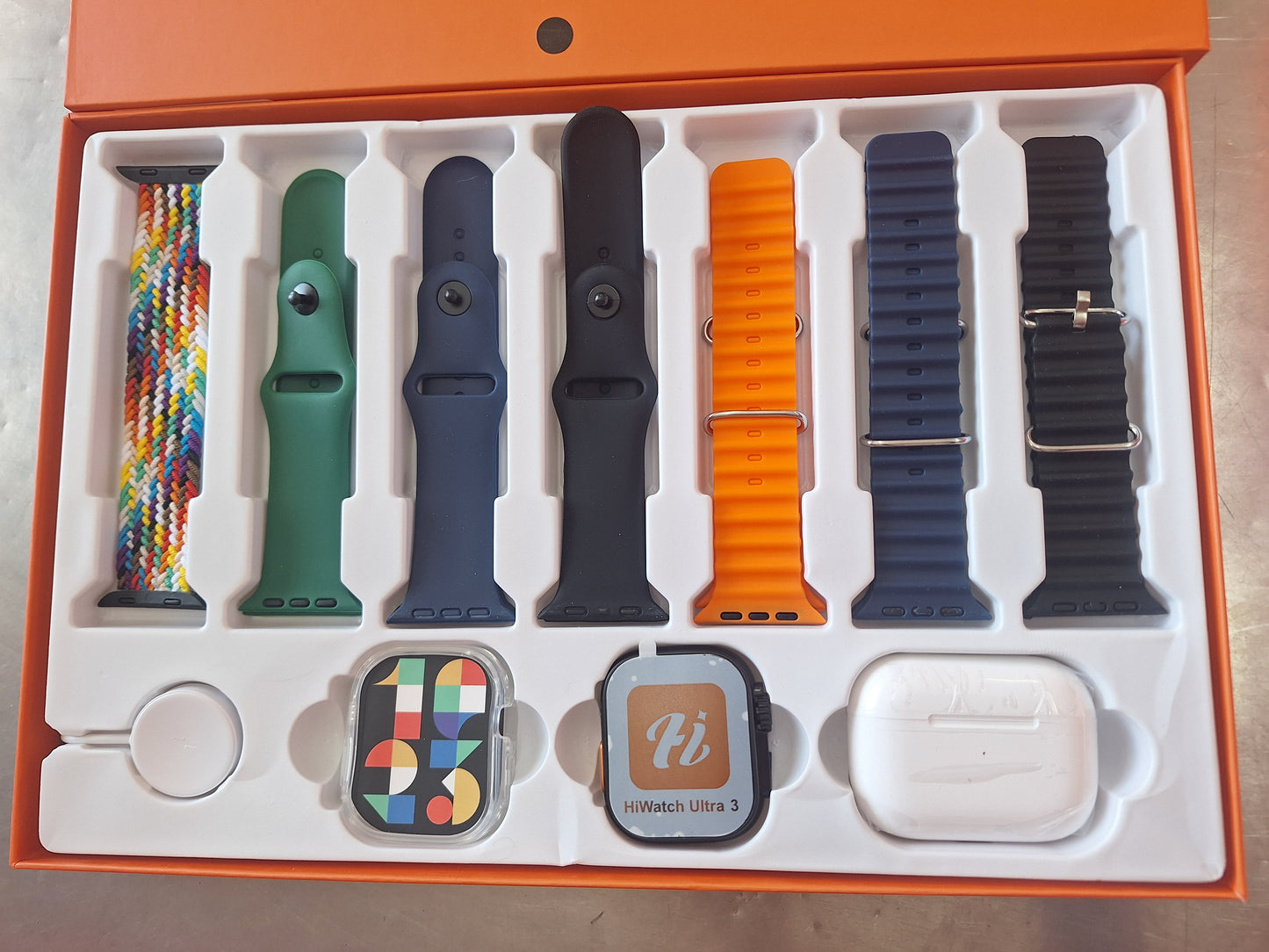 SmartWatch T900 suit con 7 correas y audífonos