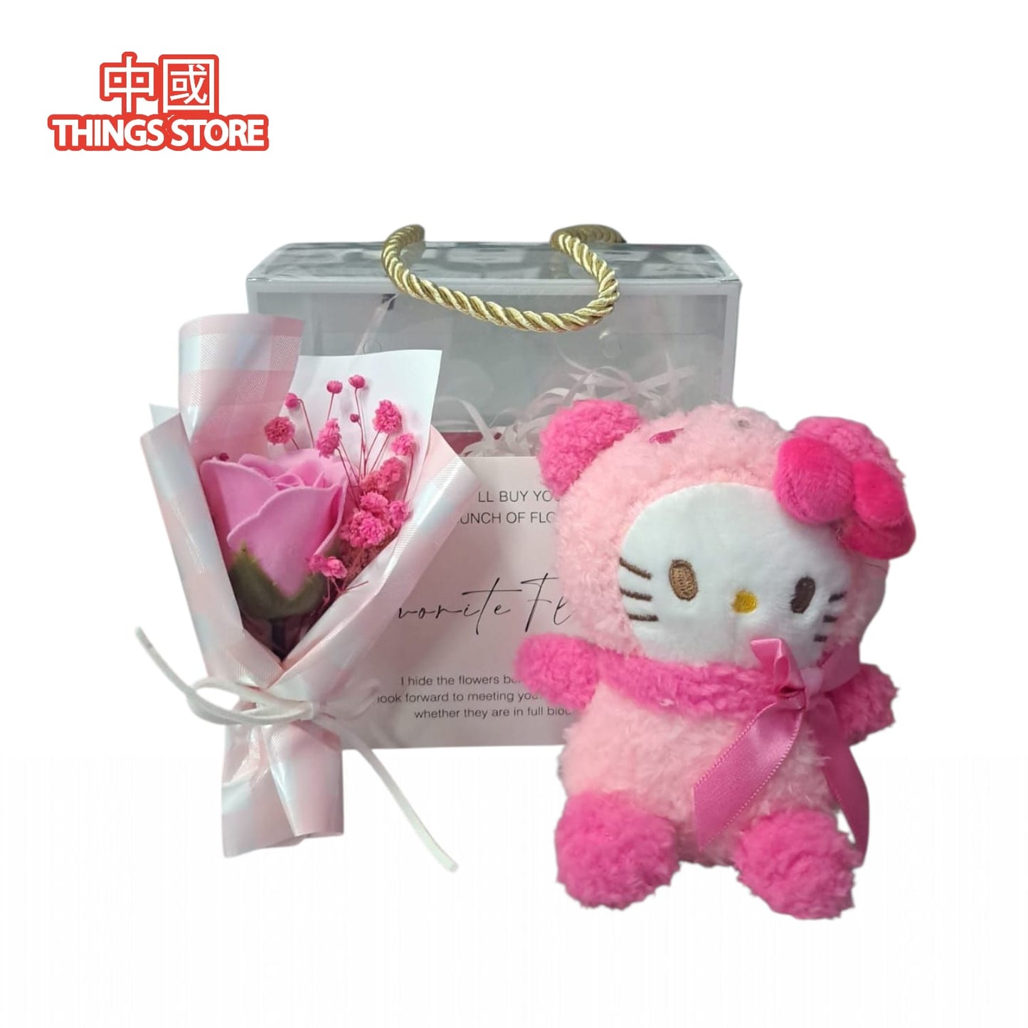 Caja con peluche y flores