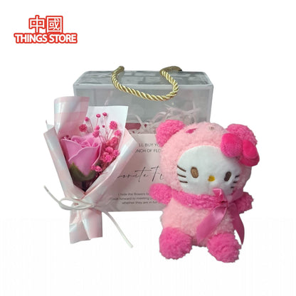 Caja con peluche y flores