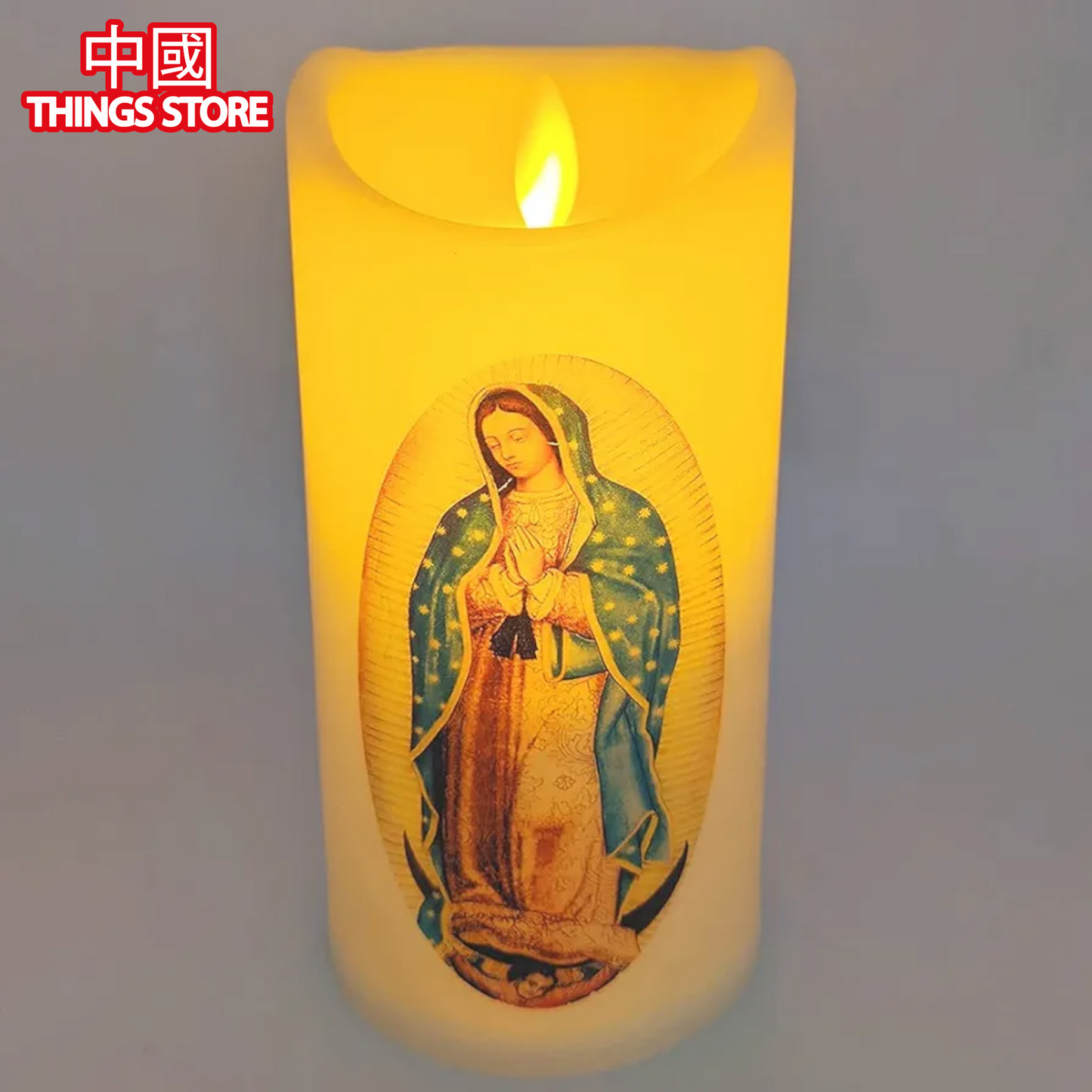 Vela con diseño de virgen