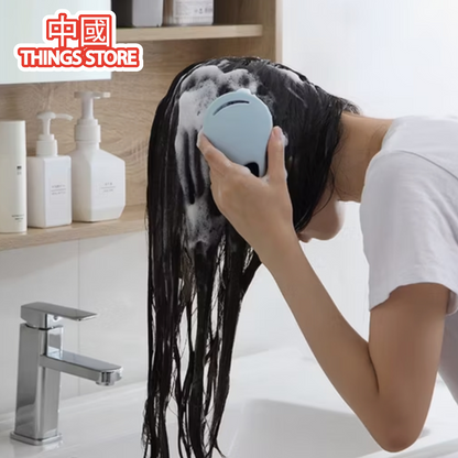 Cepillo de shampoo y masaje
